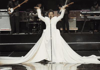 Woman In Suit Holding Cheese Sweet Dreams Are Made Of Cheese GIF