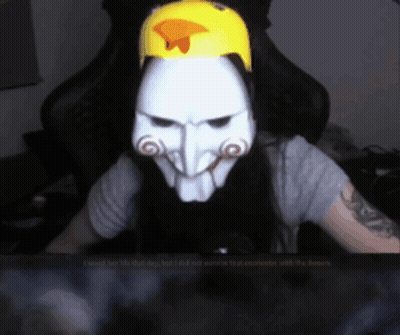 Woman In Suit Jumping In Air In Front Of Man At Desk GIF