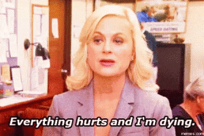 Woman In Suit Saying Everything Hurts And I'm Dying GIF