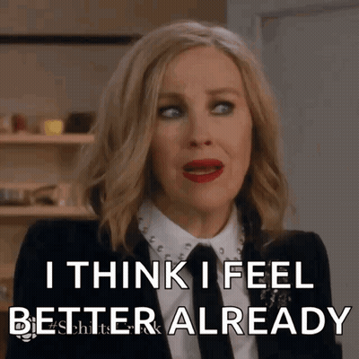 Woman in Suit Saying I Think I Feel Better Already