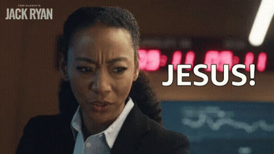 Woman In Suit Saying Jesus GIF