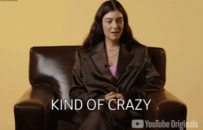 Woman In Suit Saying Kind Of Crazy GIF