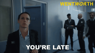 Woman In Suit Saying You're Late GIF