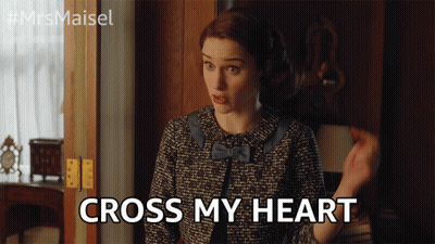 Woman In Suit Says Cross My Heart GIF