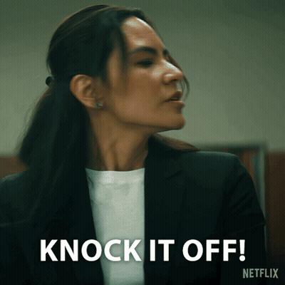 Woman In Suit Says Knock It Off Netflix Ad GIF