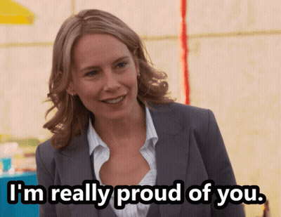 Woman In Suit Smiling Saying I'm Really Proud Of You GIF