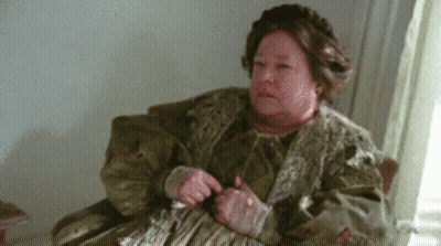 Woman In Suit Smiling Says Lies GIF