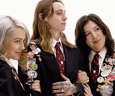 Woman In Suit With Idaho Badge GIF