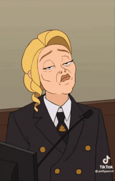 Woman In Suit With Poop On Jacket GIF