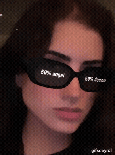 Woman In Sunglasses 50% Angel 50% Demon GIF
