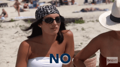 Woman In Sunglasses And Bandana Saying No GIF