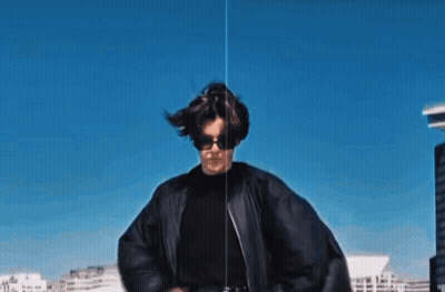 Woman In Sunglasses And Black Jacket Dancing GIF