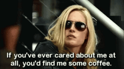 Woman In Sunglasses And Black Jacket Says If You've Ever Cared About Me You'd Find Me Coffee GIF
