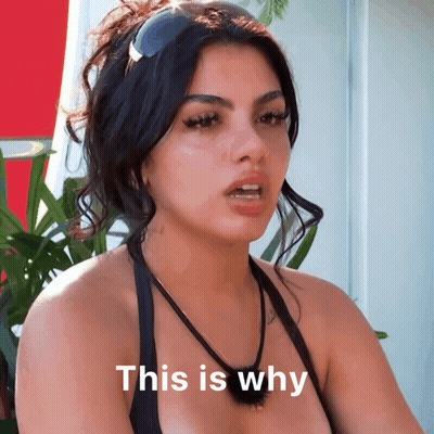 Woman In Sunglasses And Black Top Says This Is Why GIF