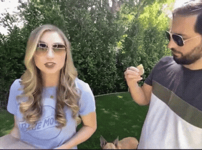 Woman In Sunglasses And Blue Moon Shirt GIF