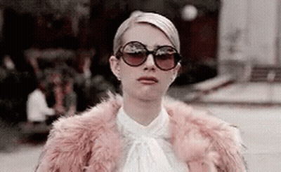 Woman In Sunglasses And Fur Coat GIF