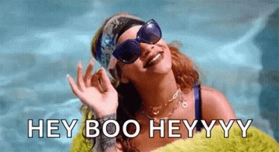 Woman In Sunglasses And Headband Saying Hey Boo GIF
