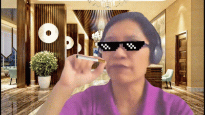 Woman In Sunglasses And Headphones Holding Cigarette GIF