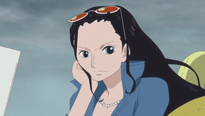 Woman In Sunglasses And Pearl Necklace Looking GIF