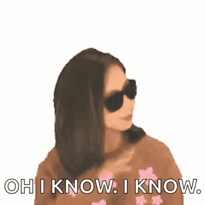 Woman In Sunglasses And Pink Flower Sweater Saying Oh I Know GIF