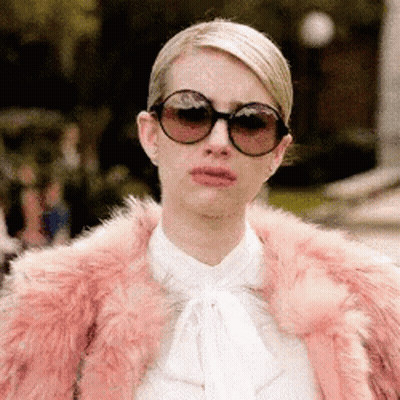 Woman In Sunglasses And Pink Fur Coat GIF