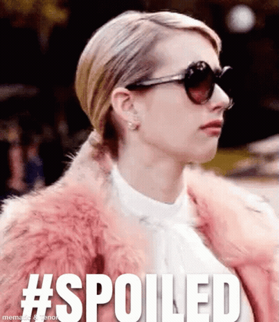Woman In Sunglasses And Pink Fur Coat Saying Spoiled GIF