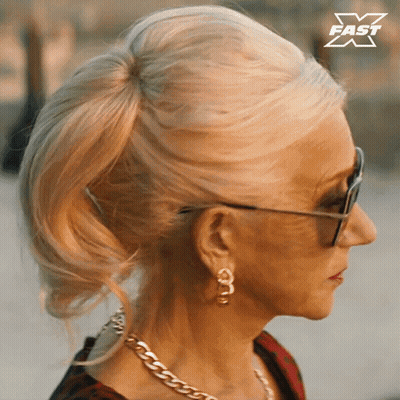 Woman In Sunglasses And Ponytail With X Fast Logo GIF