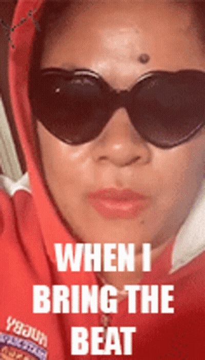 Woman In Sunglasses And Red Hoodie Saying When I Bring The Beat GIF