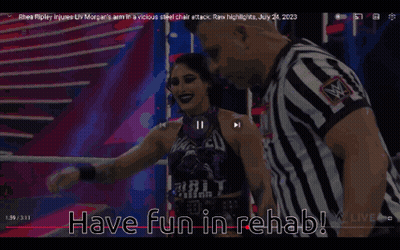 Woman In Sunglasses And Red Jacket Pointing Up Saying This 1 All Of This GIF
