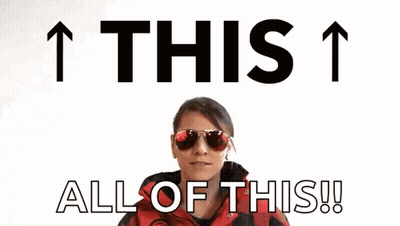 Woman In Sunglasses And Red Jacket Pointing Up Saying This 1 All Of This GIF