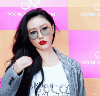 Woman In Sunglasses And Red Lipstick At Scene Sign GIF