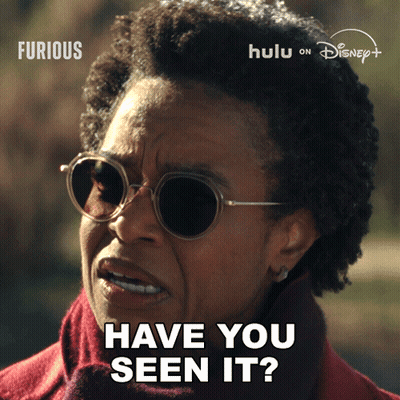 Woman In Sunglasses Asking If She Has Seen It GIF