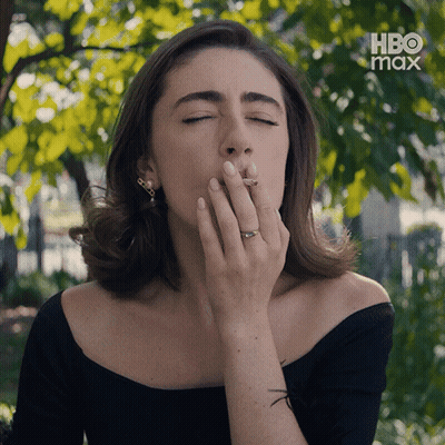Woman In Sunglasses Covering Eyes GIF