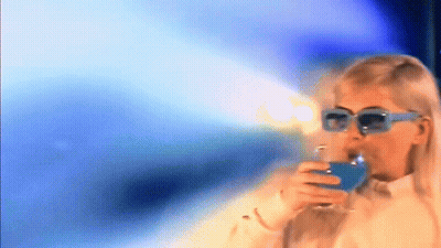 Woman In Sunglasses Drinking Blue Beverage GIF