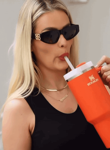 Woman In Sunglasses Drinking From Orange Tumbler GIF
