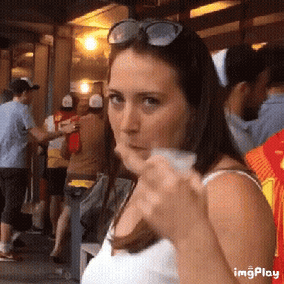 Woman In Sunglasses Holding Cup GIF