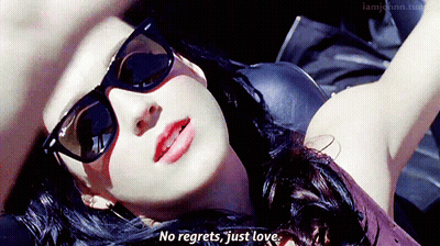 Woman In Sunglasses Laying Down Says No Regrets Just Love GIF