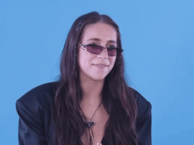 Woman In Sunglasses Making Funny Face GIF