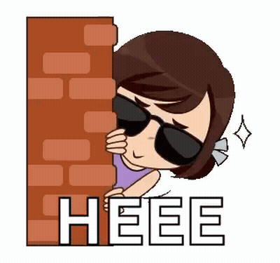 Woman In Sunglasses Peeking From Behind Brick Wall GIF