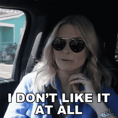 Woman In Sunglasses Saying I Don't Like It GIF