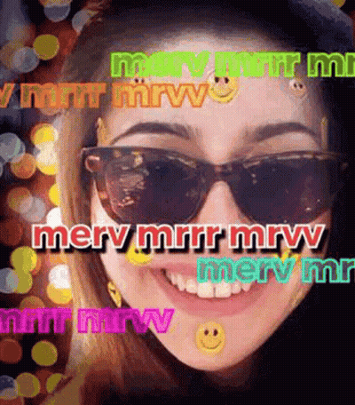 Woman In Sunglasses Saying Merry GIF