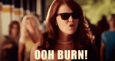 Woman in Sunglasses Saying Ooh Burn