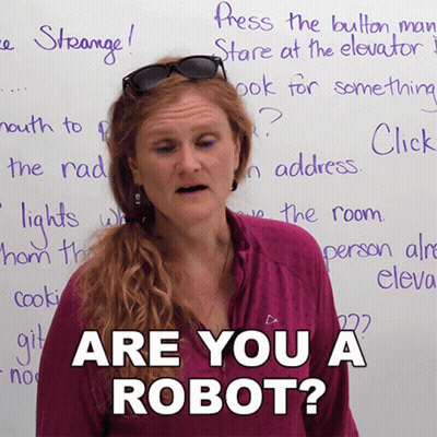 Woman In Sunglasses Says Are You A Robot GIF