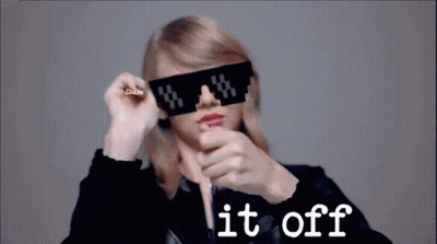Woman In Sunglasses Shake It Off GIF