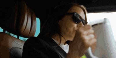 Woman In Sunglasses Sitting In Driver Seat GIF