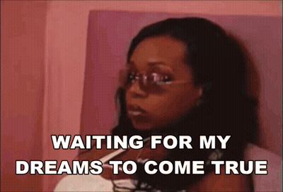 Woman In Sunglasses Sitting On Bed Waiting For Dreams GIF