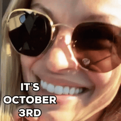 Woman In Sunglasses Smiling It's October 3Rd GIF