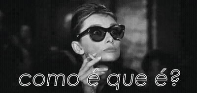 Woman In Sunglasses Smoking Cigarette Holding Wine Glass GIF