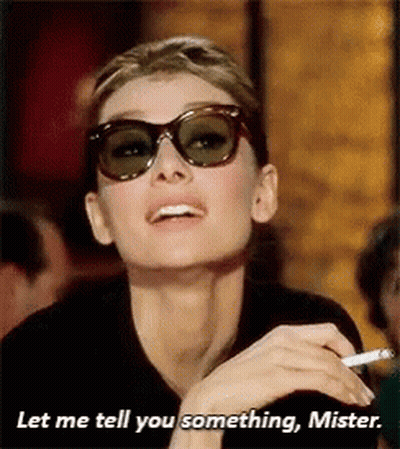 Woman In Sunglasses Smoking Saying Let Me Tell You Something Mister GIF