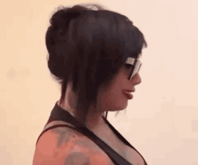 Woman In Sunglasses Sticking Out Tongue GIF